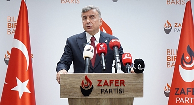 AZMİ KARAMAHMUTOĞLU: